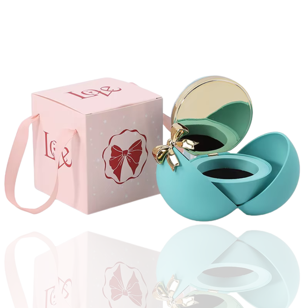 Boite à bijoux bleu avec noeud de papillon