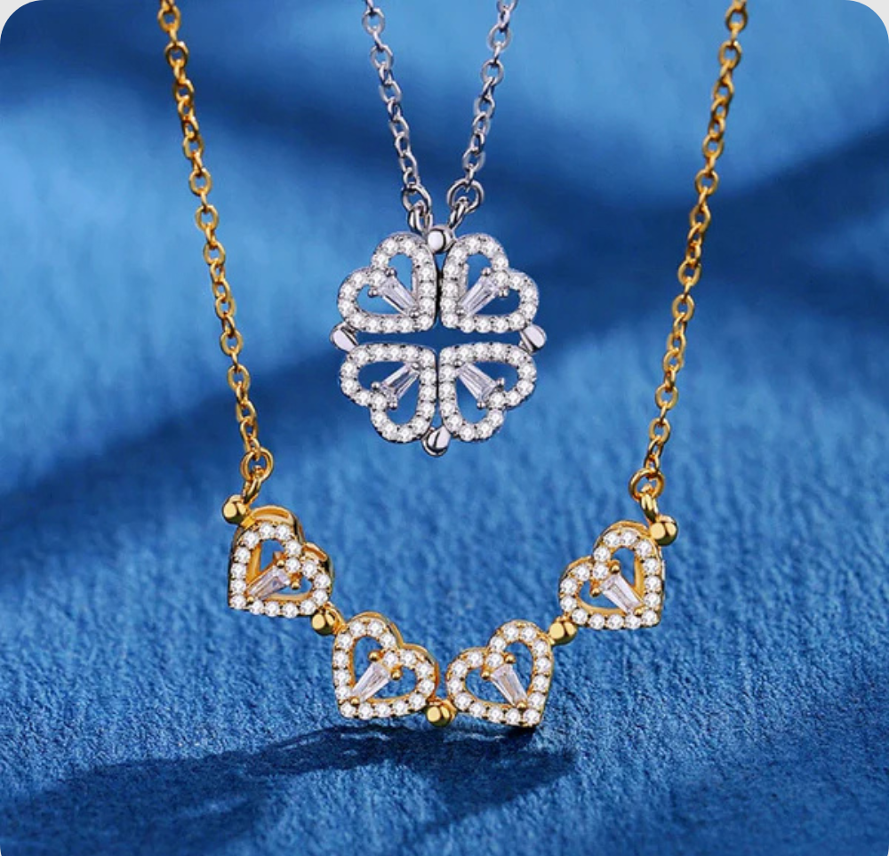 Collier aimanté en or et en argent en forme de trèfle