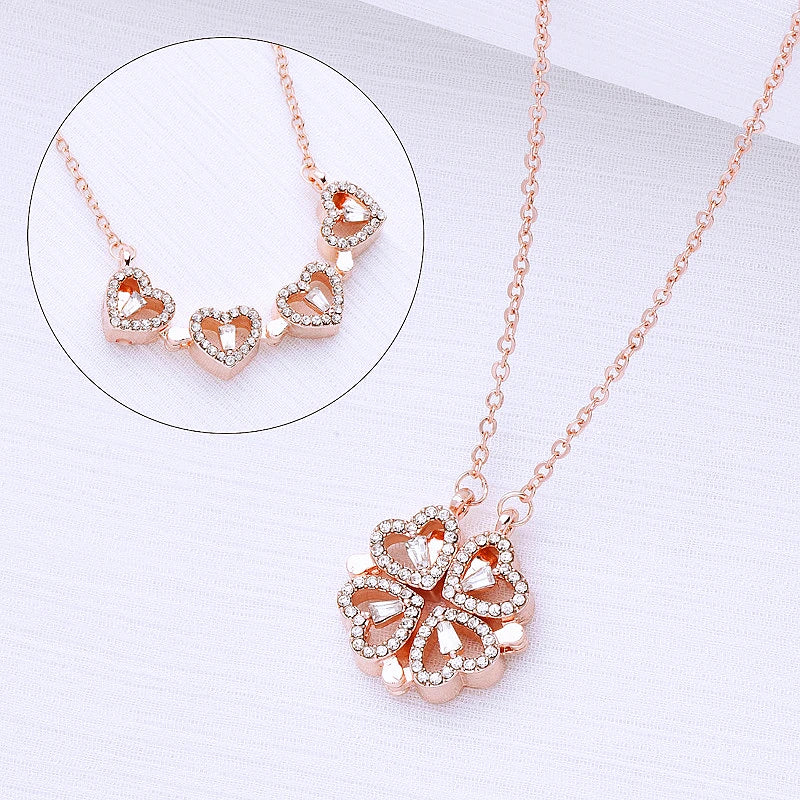 Collier en or rose en forme de trèfle aimanté