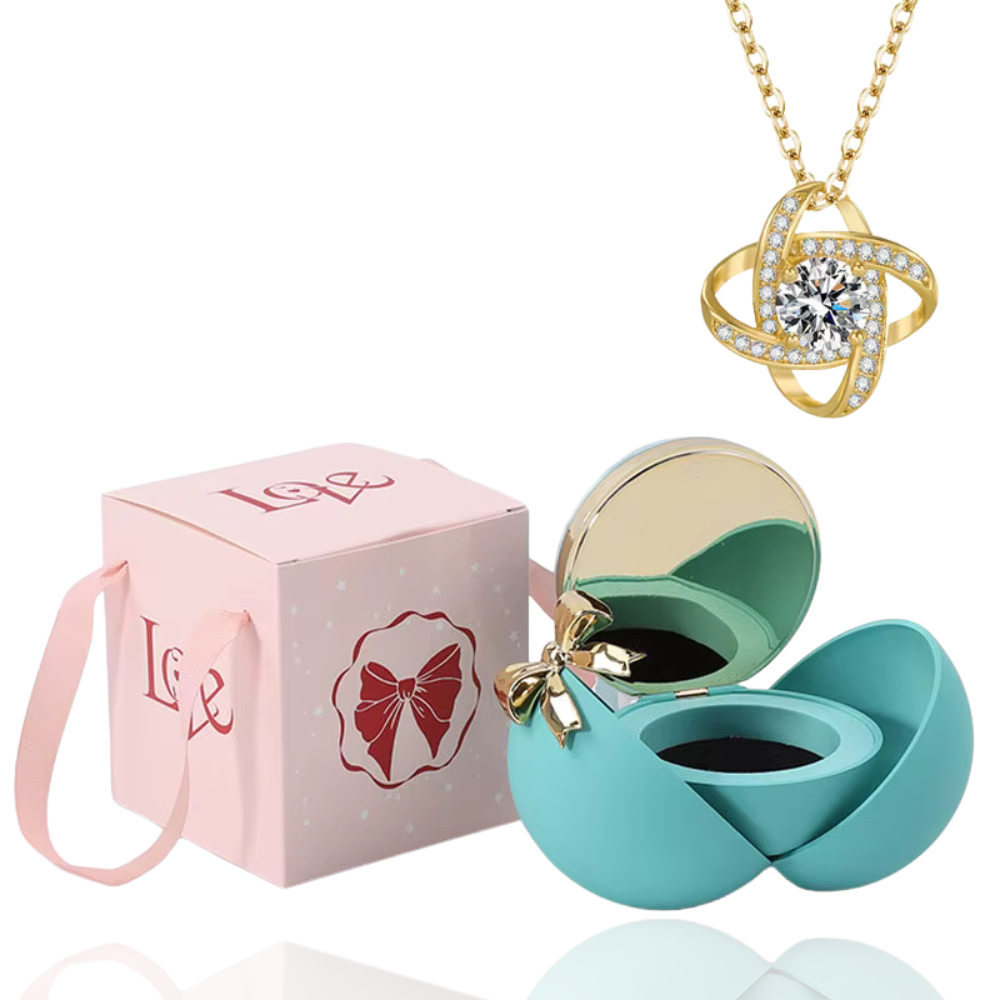 Boite à bijoux bleu avec collier en or