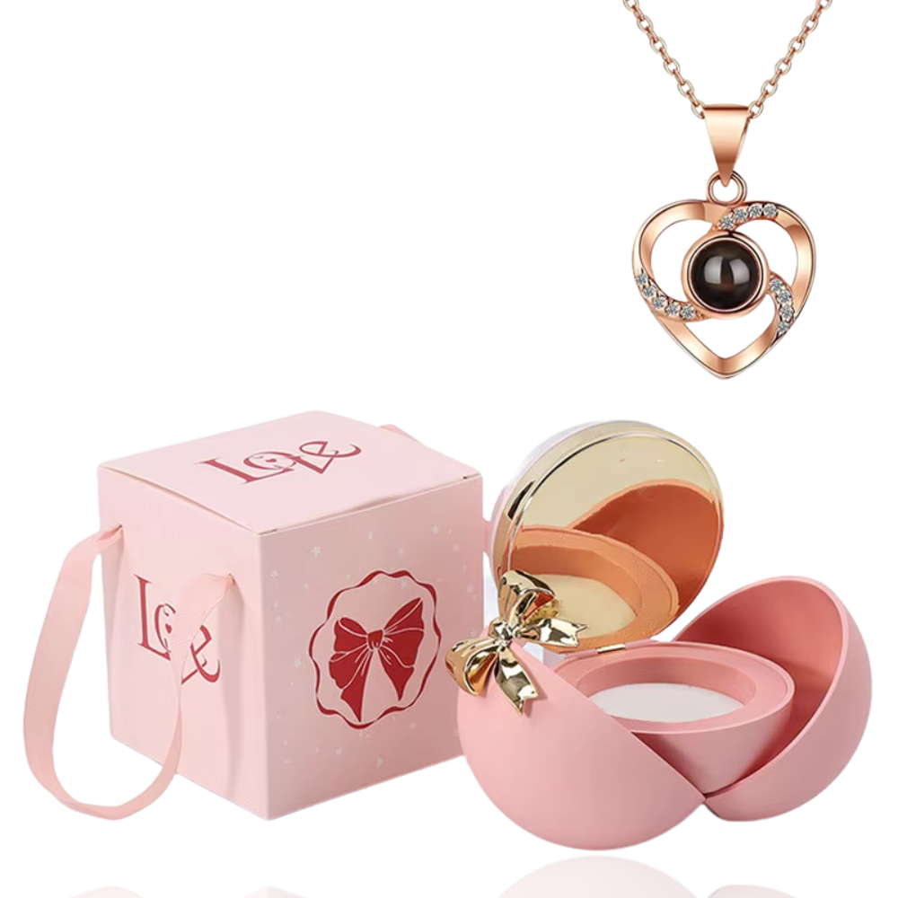 Boite à bijoux rose avec collier en forme de coeur or rose