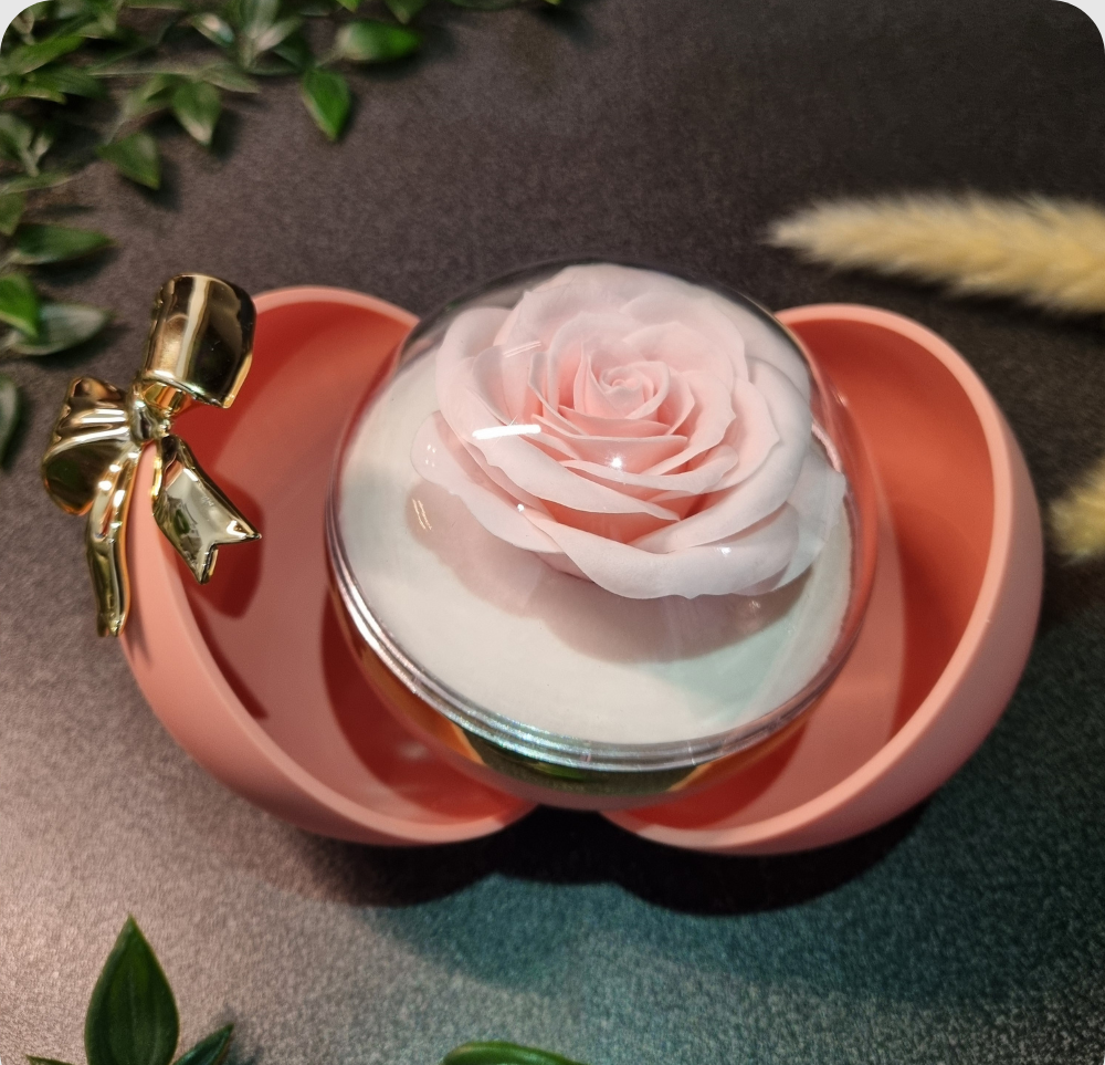 Boite à bijoux rose avec noeud de papillon